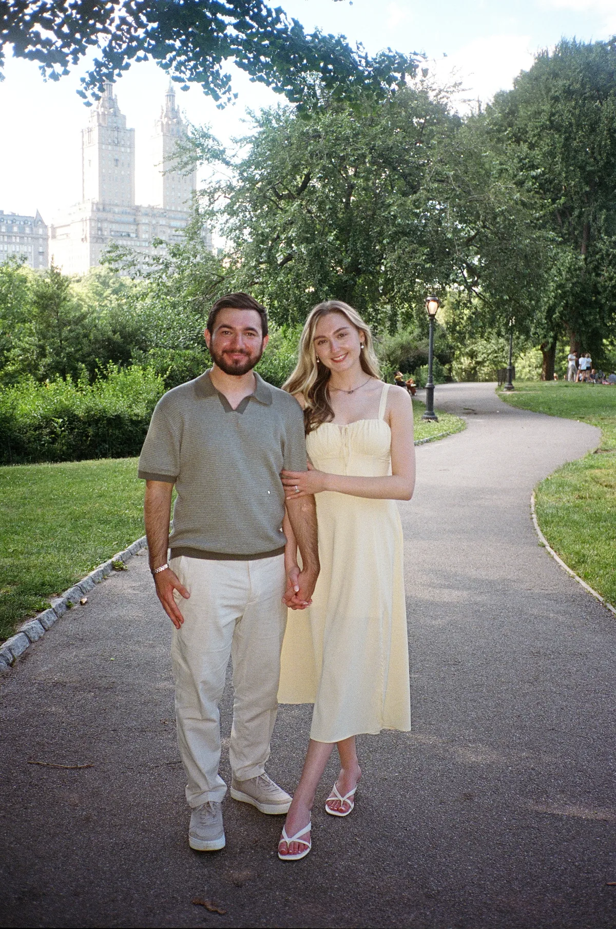Christopher and Jacqueline walking hand in hand through Central Park